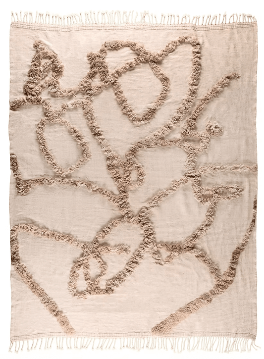 Woven For Him rug by Moe Khadra, showcasing intricate design and natural textures in soft neutral tones.