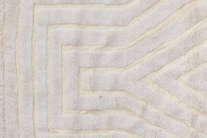 Nomad Lines – Ivory Moroccan Rug close-up showcasing the sculpted linear patterns and soft ivory color.