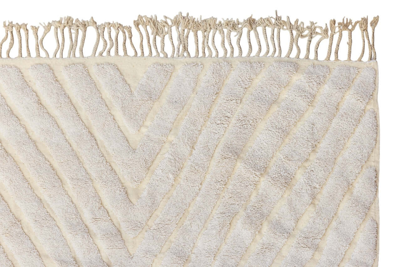 Nomad Lines – Ivory Moroccan Rug with raised texture and linear patterns, showcasing its serene elegance.