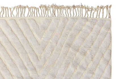 Nomad Lines – Ivory Moroccan Rug with raised texture and linear patterns, showcasing its serene elegance.